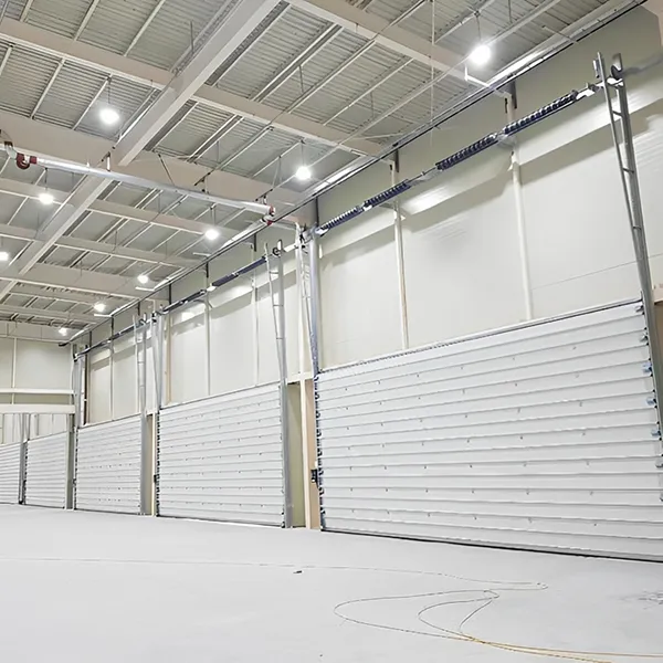 Industrial sectional door with back rib